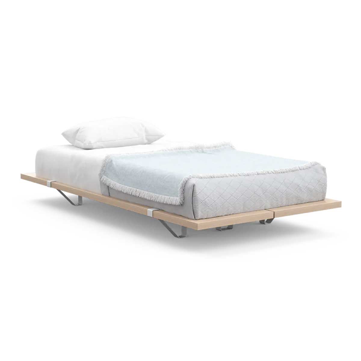 Floyd Home Platform Bed includes a wood and metal base that sits low to the ground.