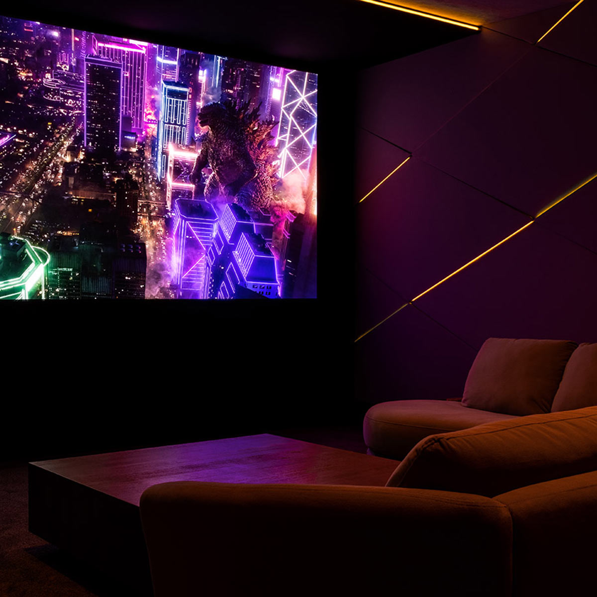 Push Home Theater with massive screen, plush red seating, and sound control walls with diamond-shaped theater lighting